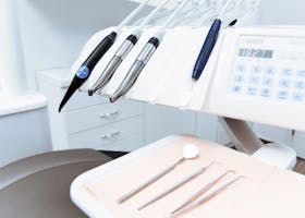 Clean and professional dental office setup with tools ready for patient treatment.