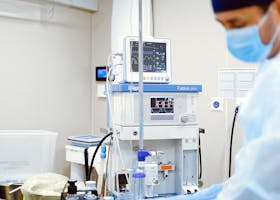 Close-up of advanced medical equipment in a sterile operating room setting.
