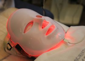 Close-up of an LED light mask used in modern skincare treatments.